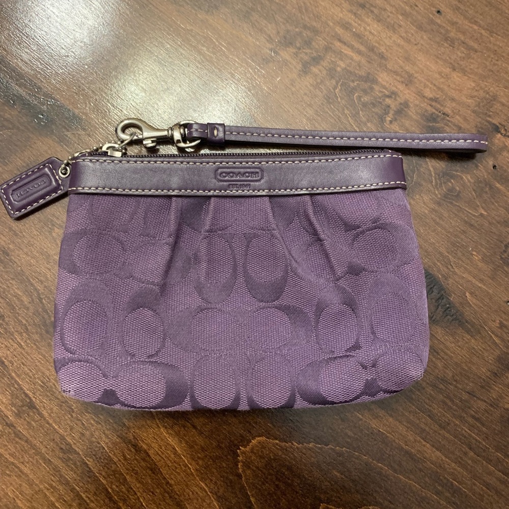 Coach wristlet purple.